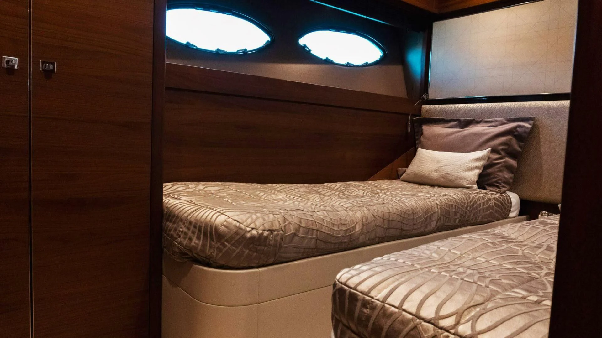 a room with two beds aboard MOIRA CINCO Yacht for Sale