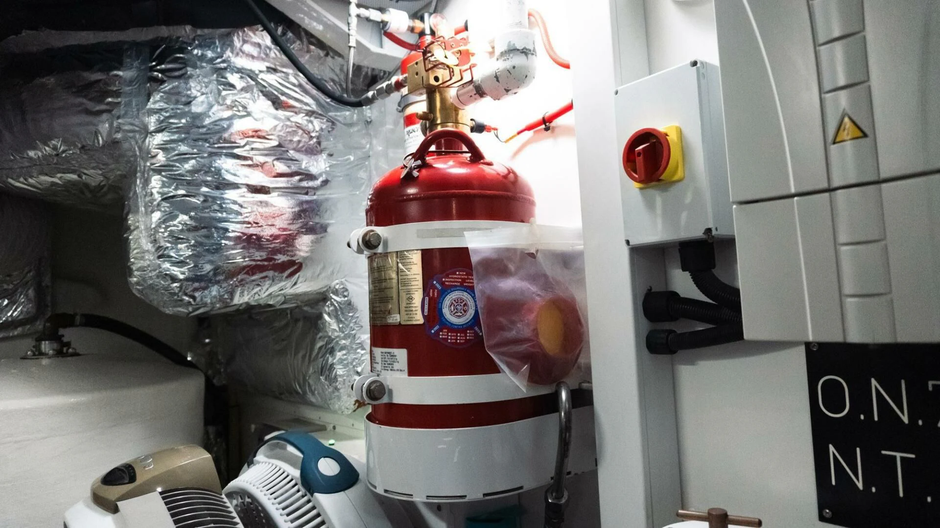 a red and white fire hydrant aboard MOIRA CINCO Yacht for Sale