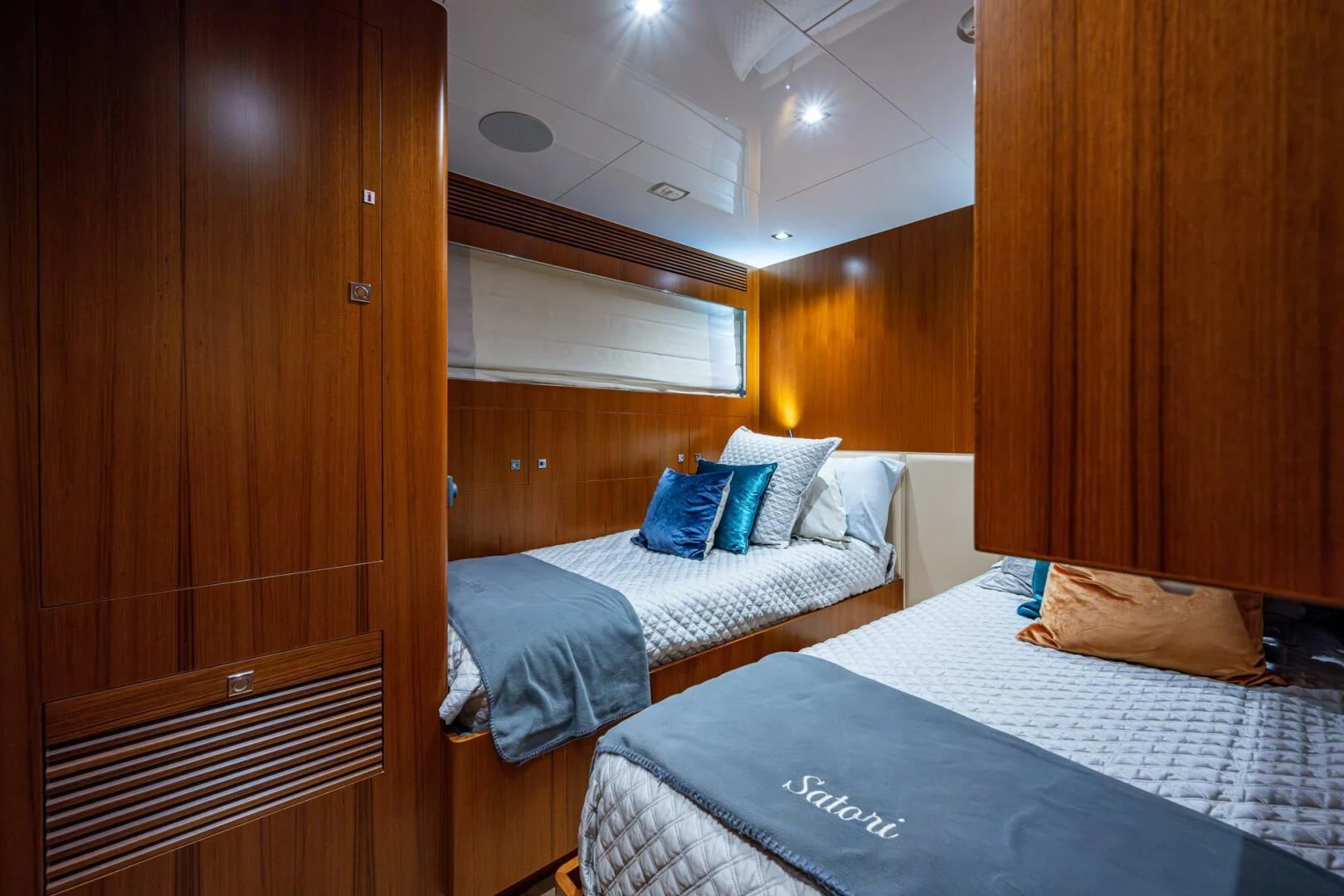 a room with two beds aboard MOIRA CINCO Yacht for Sale