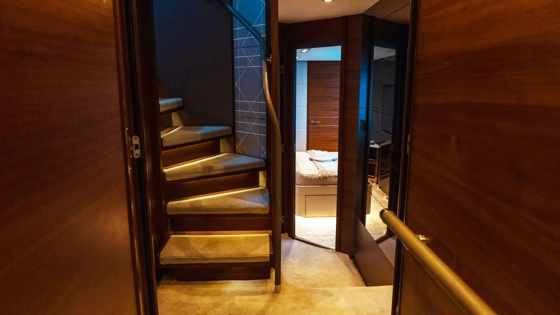 a set of stairs leading to a door aboard MOIRA CINCO Yacht for Sale