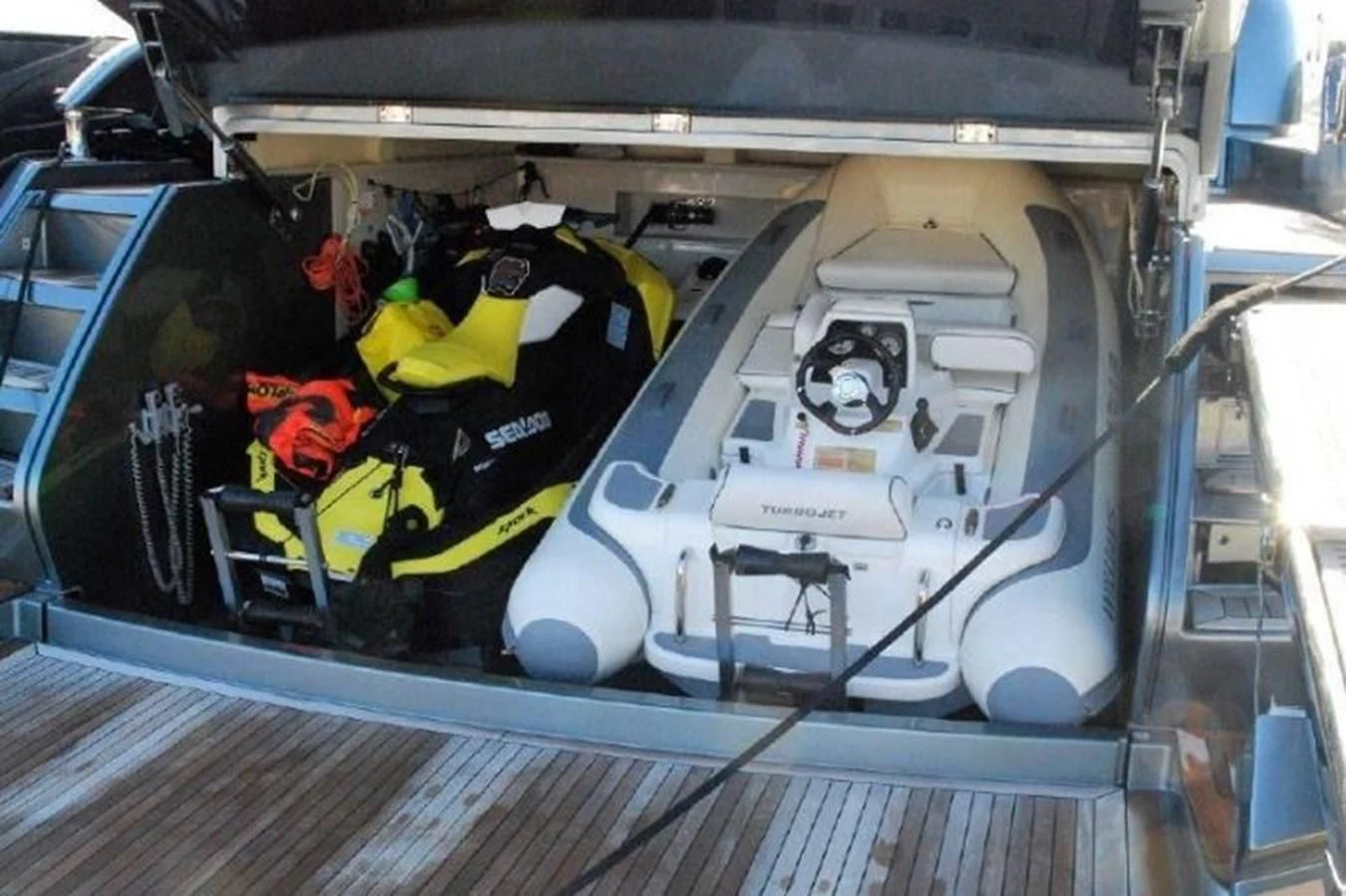 a car with its hood open aboard MOIRA CINCO Yacht for Sale