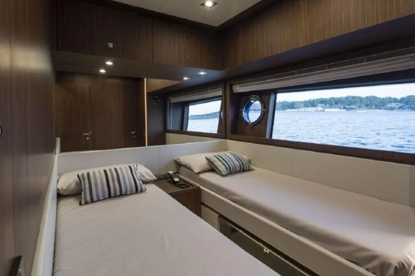 a room with two beds aboard MOIRA CINCO Yacht for Sale