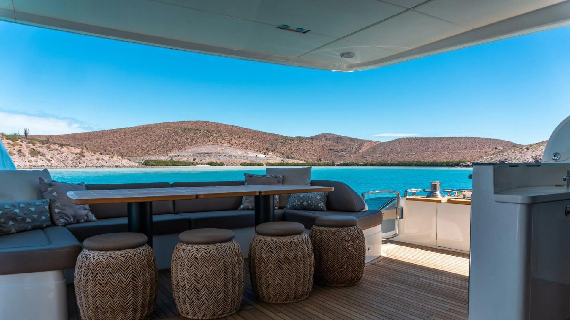 a table with chairs on it aboard MOIRA CINCO Yacht for Sale