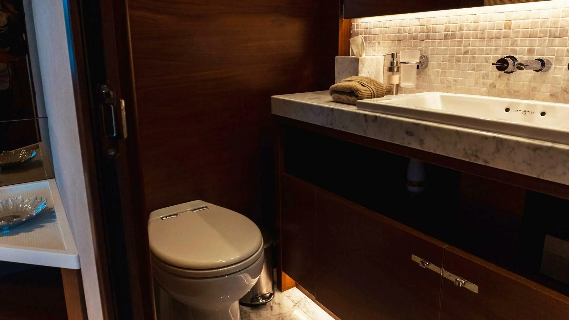 a bathroom with a sink and a toilet aboard MOIRA CINCO Yacht for Sale