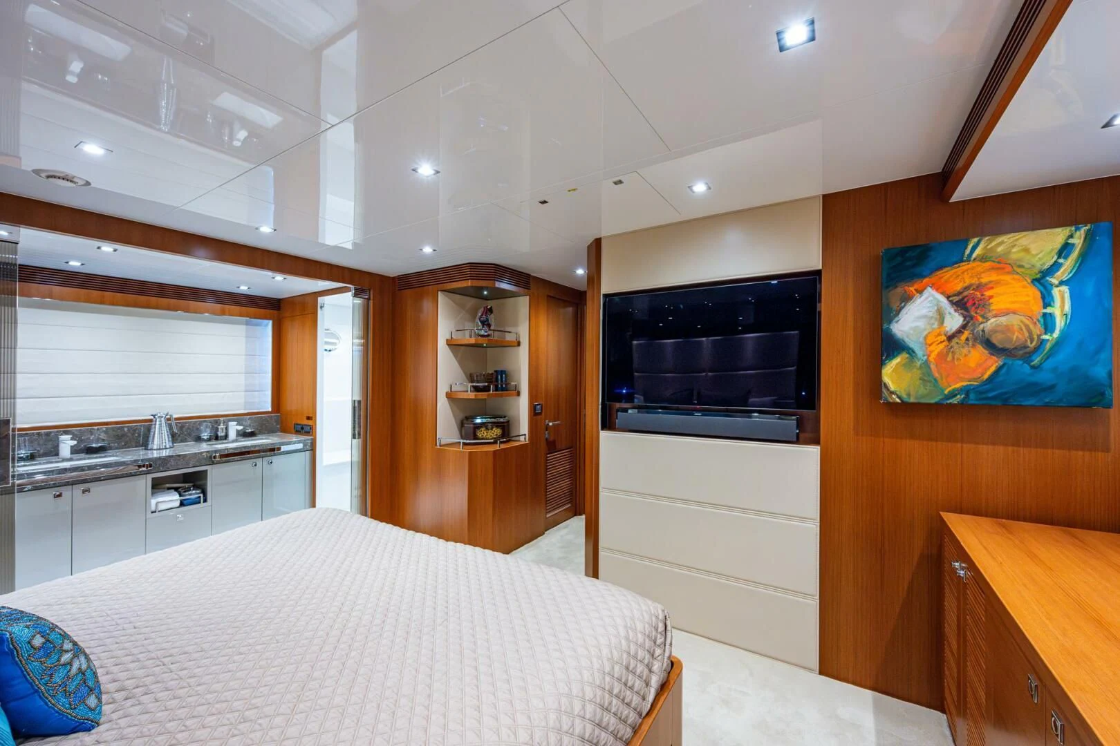 a bedroom with a bed and a microwave aboard MOIRA CINCO Yacht for Sale