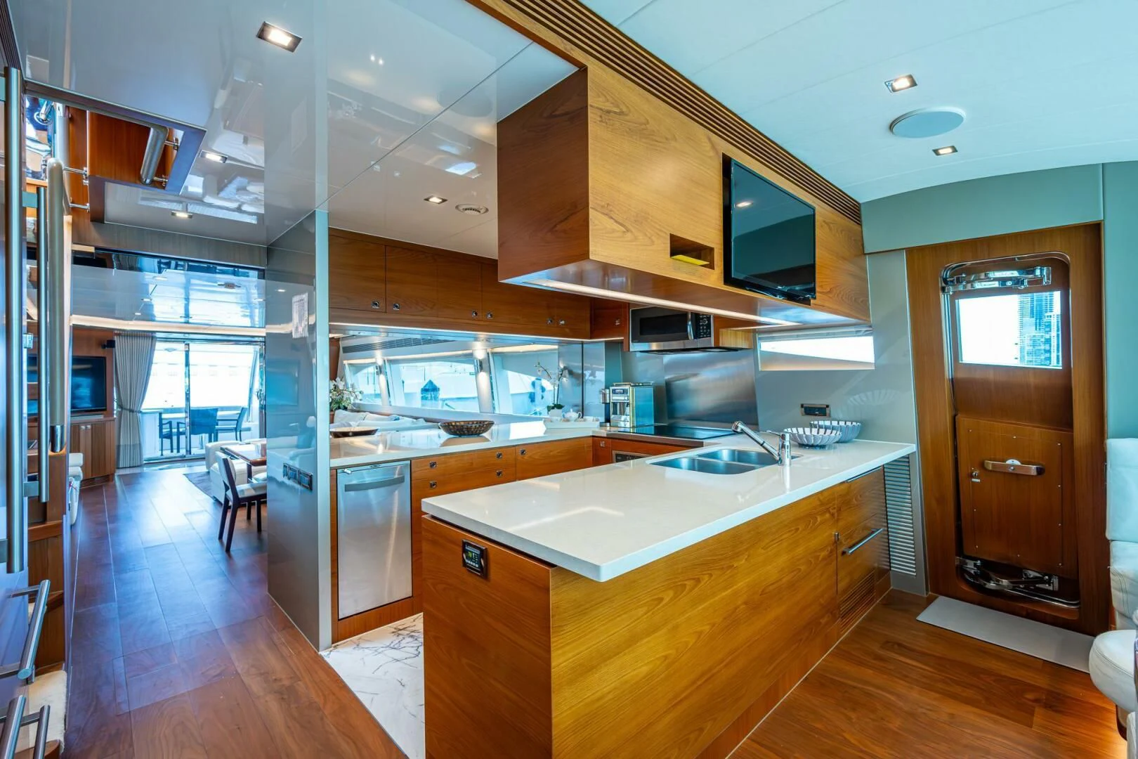 a kitchen with a large island aboard MOIRA CINCO Yacht for Sale