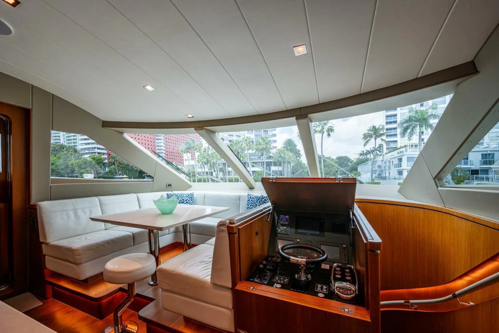 a kitchen with a stove and a table aboard MOIRA CINCO Yacht for Sale