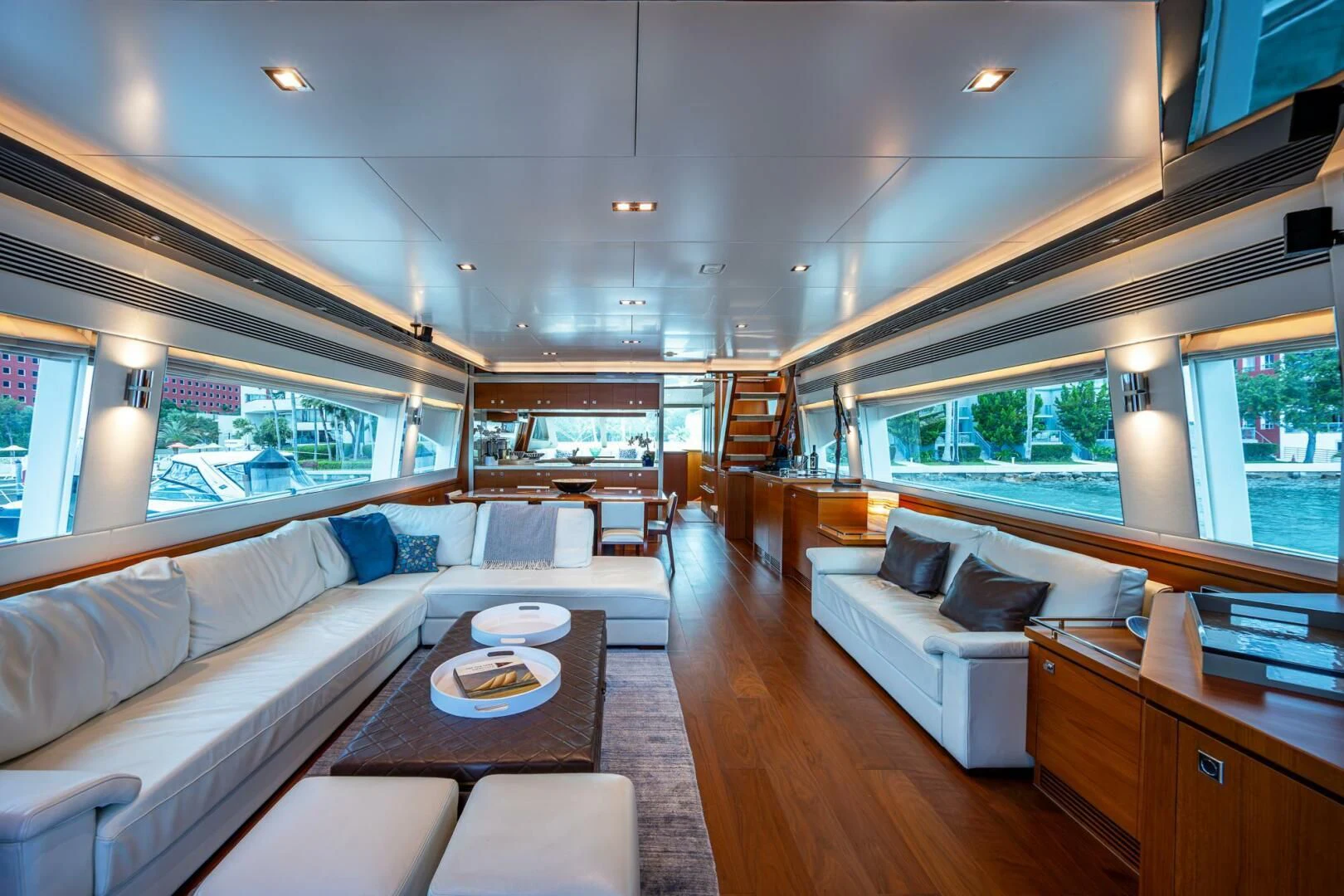 a living room with a large window aboard MOIRA CINCO Yacht for Sale