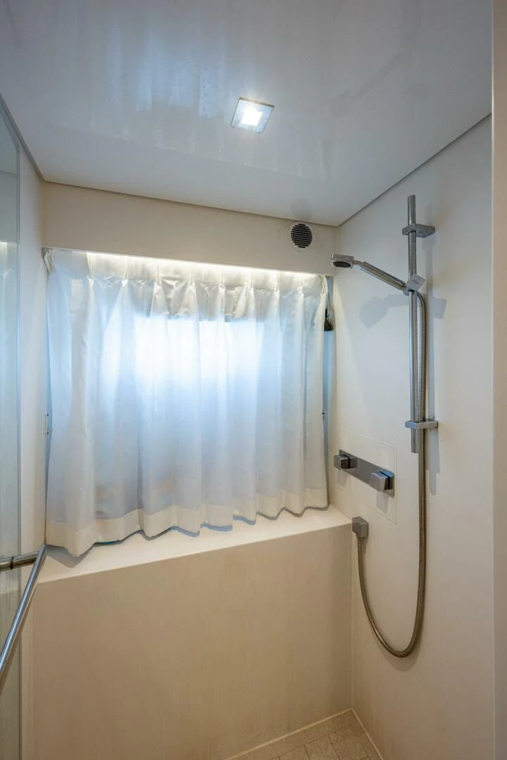 a shower unit with a curtain aboard MOIRA CINCO Yacht for Sale