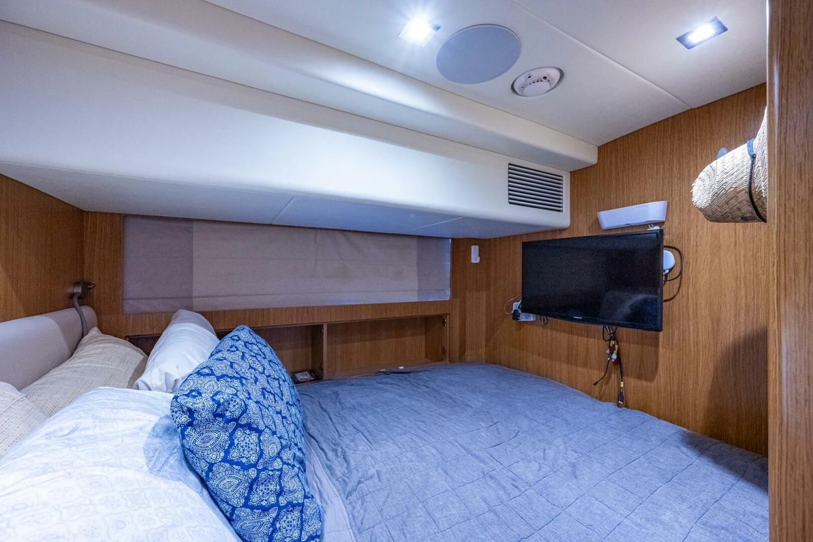 a bed with a television on top of it aboard MOIRA CINCO Yacht for Sale