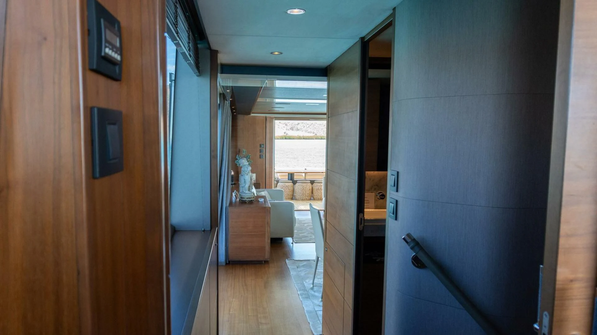 a room with a wood door and a wood cabinet aboard MOIRA CINCO Yacht for Sale
