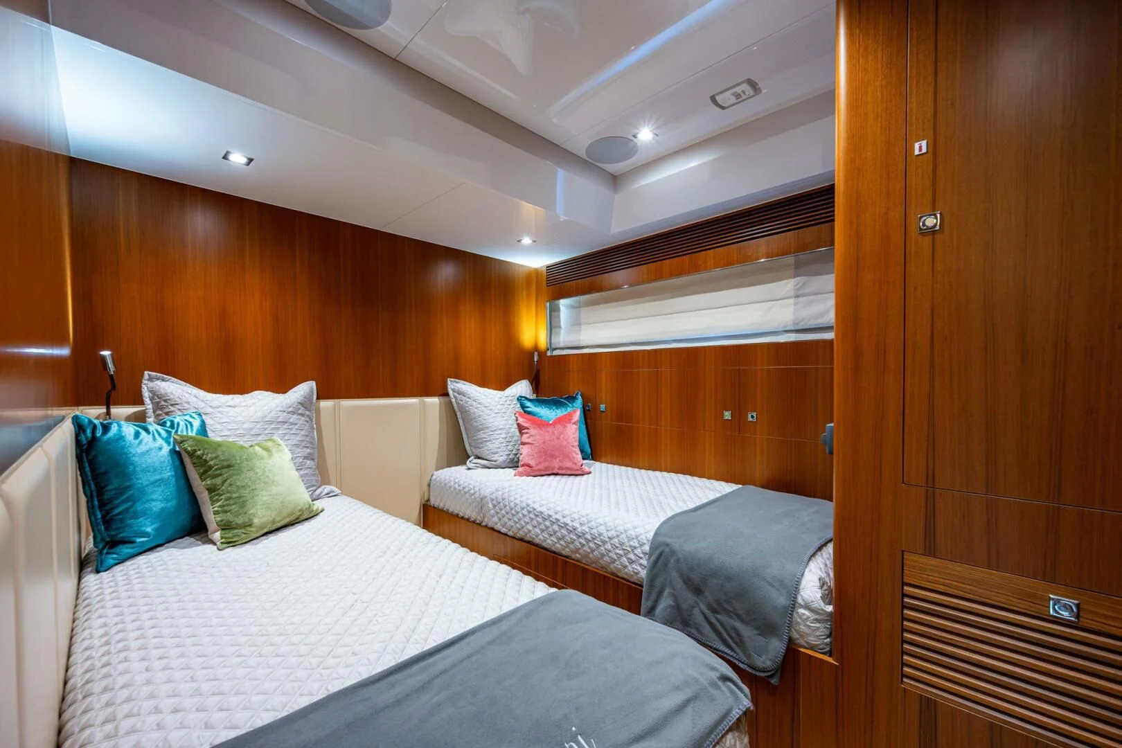a room with two beds aboard MOIRA CINCO Yacht for Sale