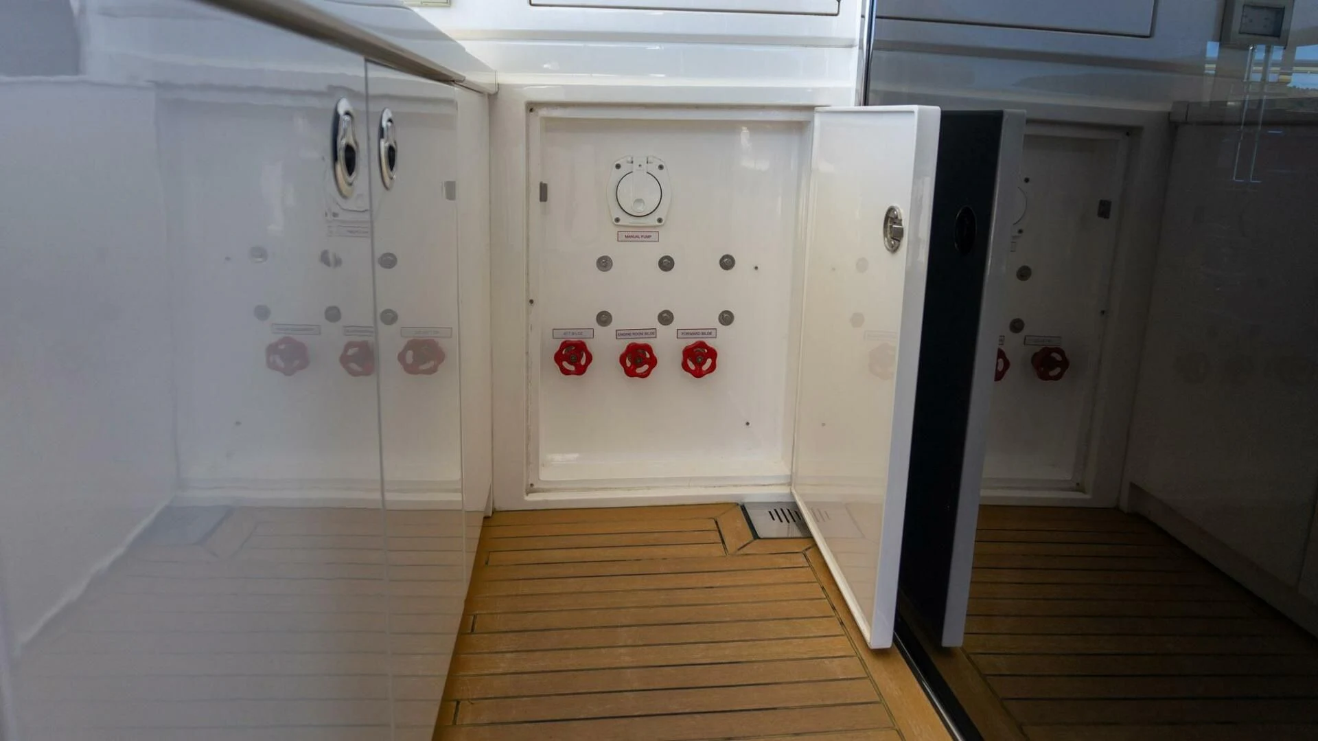 a room with white cabinets aboard MOIRA CINCO Yacht for Sale