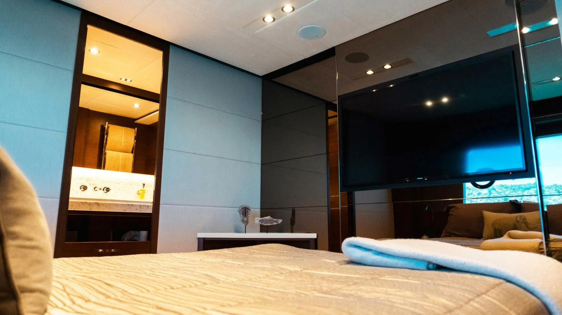 a room with a bed and a window aboard MOIRA CINCO Yacht for Sale