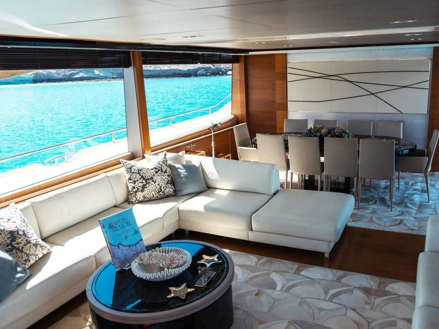 a living room with a large window aboard MOIRA CINCO Yacht for Sale