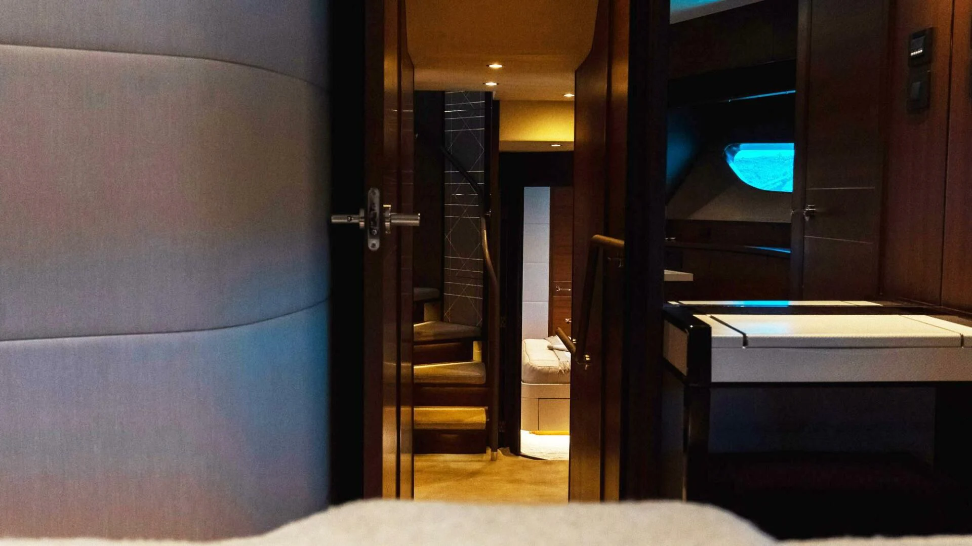 a room with a door and a staircase aboard MOIRA CINCO Yacht for Sale