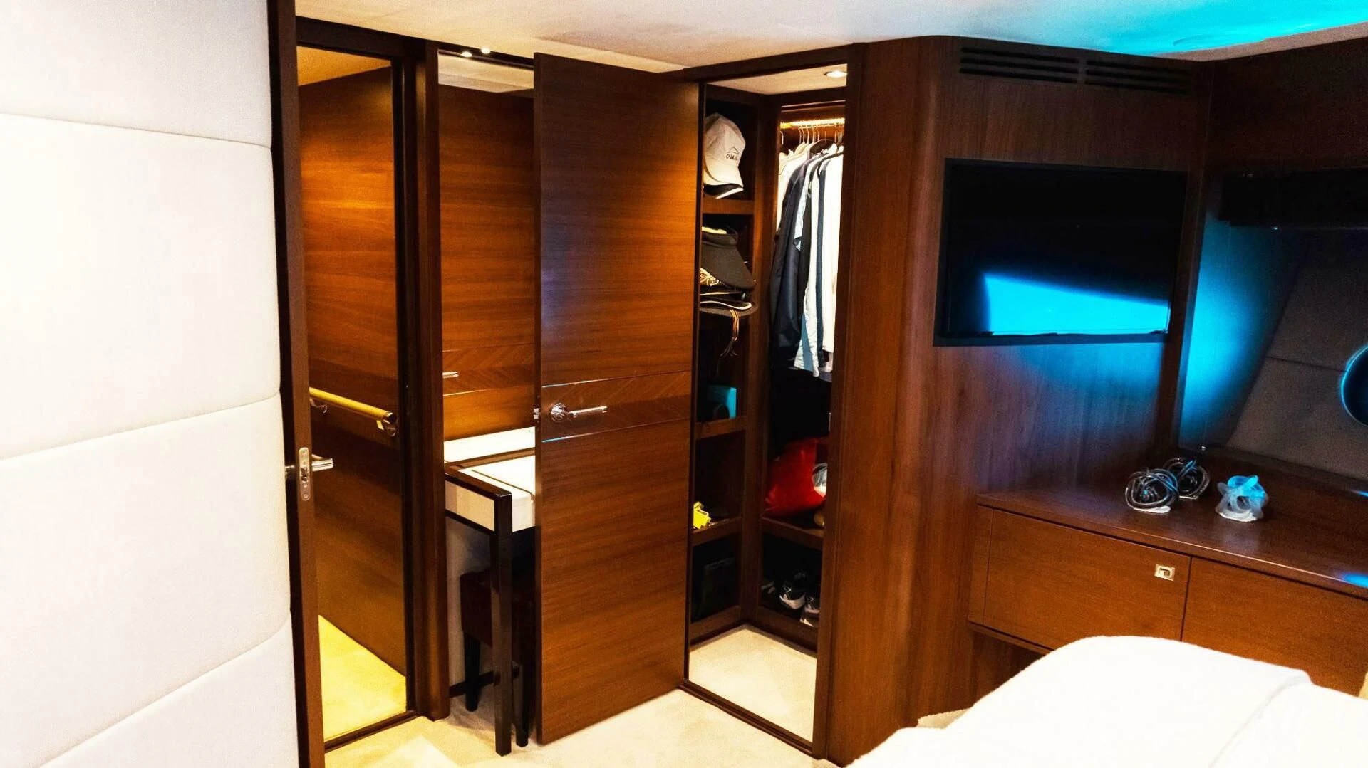 a closet with a mirror aboard MOIRA CINCO Yacht for Sale