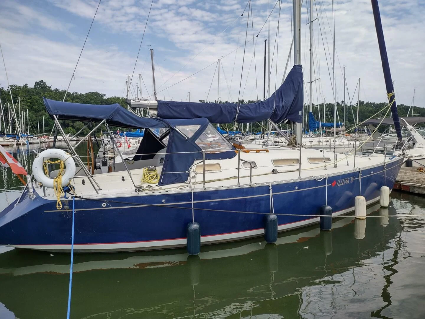 a boat is parked in the water aboard ILLUSION XI Yacht for Sale