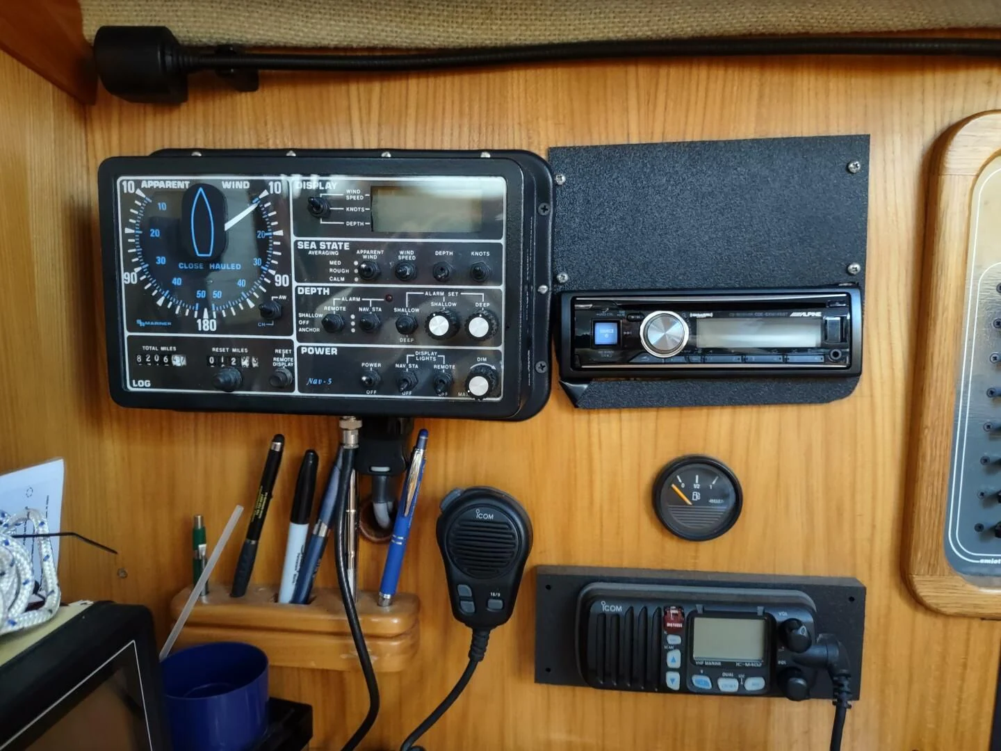 a black box with a black speaker on a wooden surface aboard ILLUSION XI Yacht for Sale