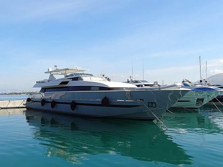a couple of boats sit in a harbor aboard ILLUSION XI Yacht for Sale