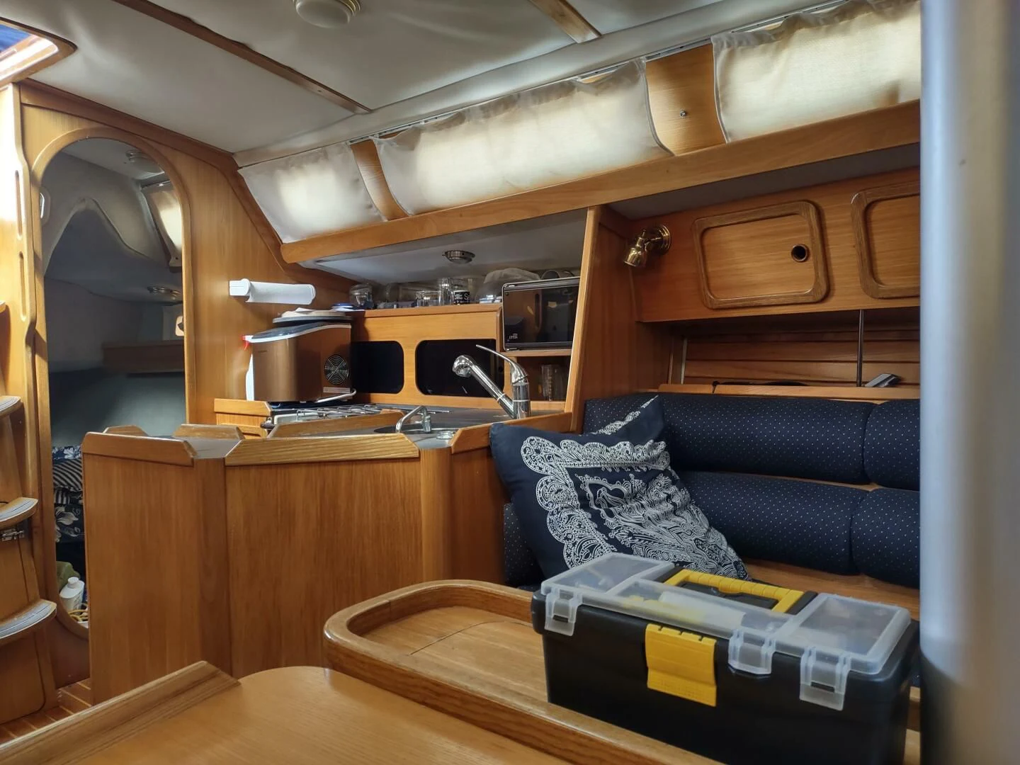 a room with a couch and a table aboard ILLUSION XI Yacht for Sale