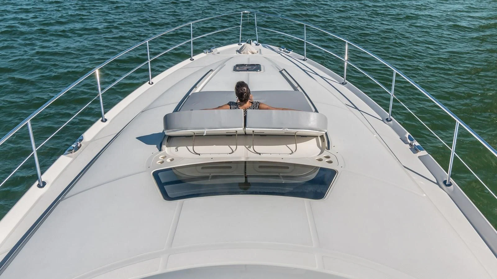 a person in a white boat aboard XANADU Yacht for Sale