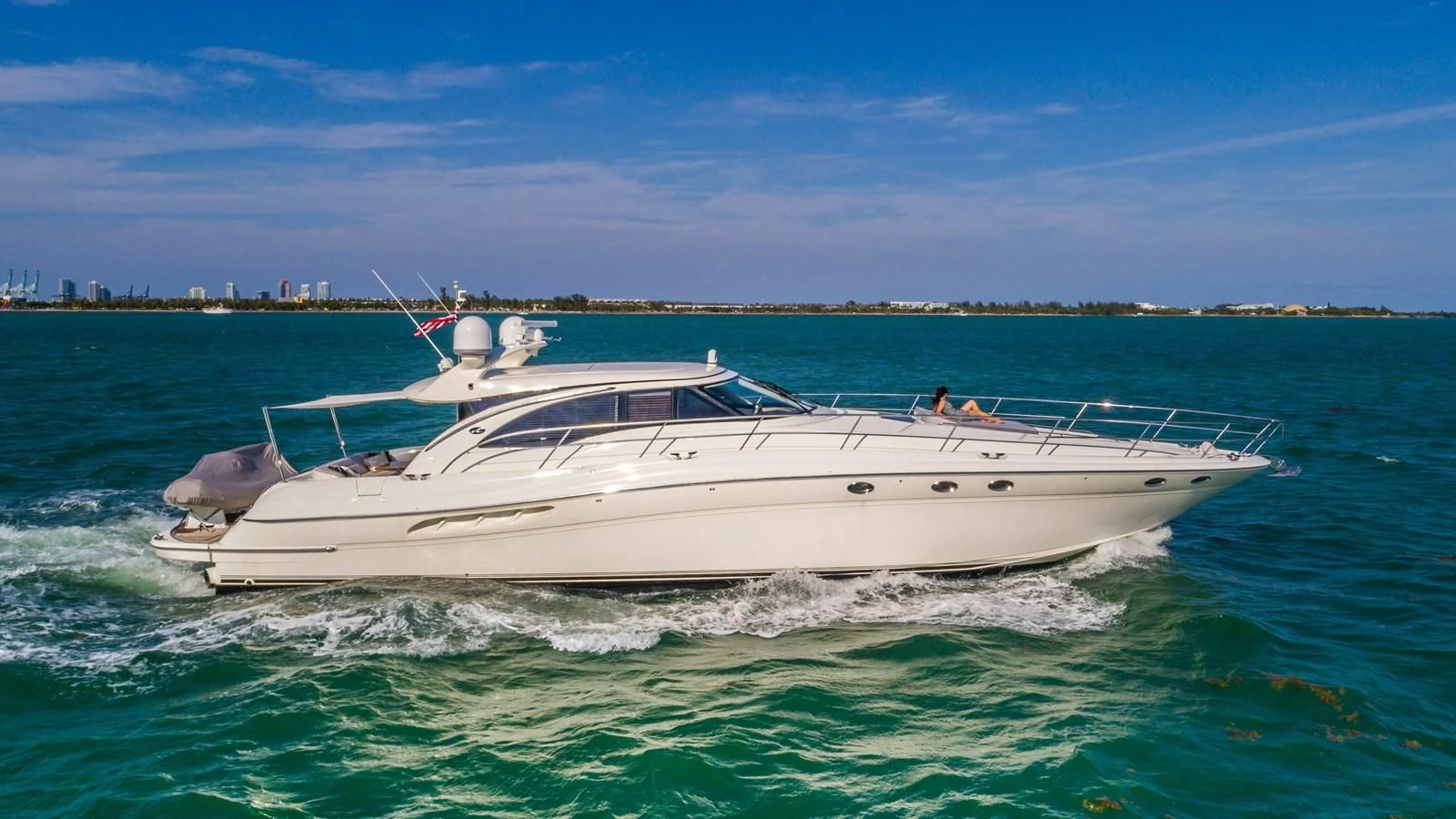a white boat in the water aboard XANADU Yacht for Sale
