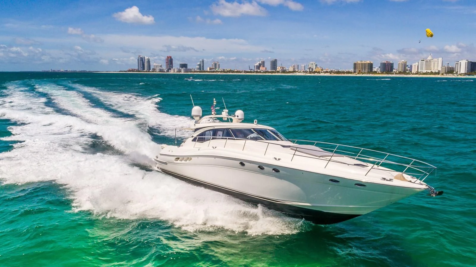 a white yacht on the water aboard XANADU Yacht for Sale