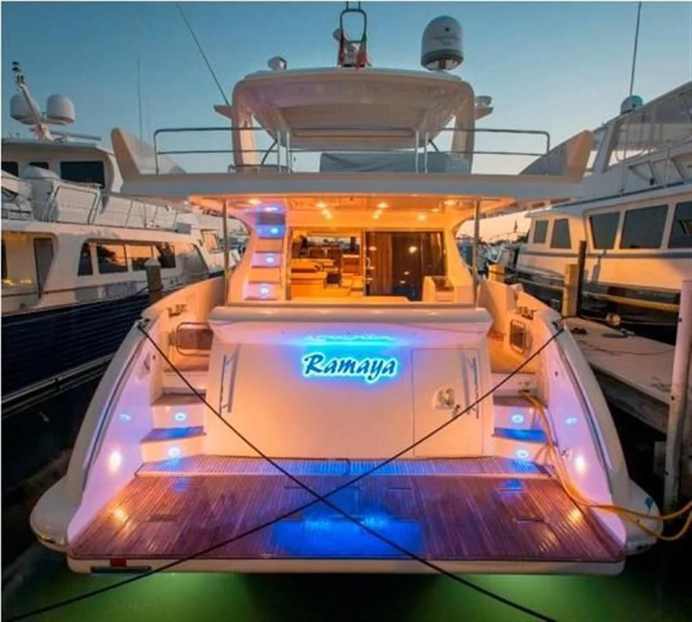 a large boat in a harbor aboard RAMAYA Yacht for Sale