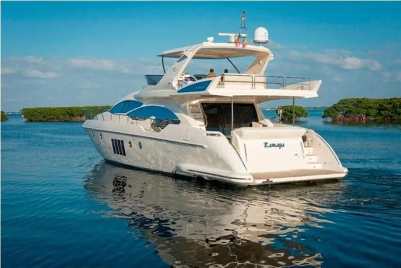 a white boat on the water aboard RAMAYA Yacht for Sale
