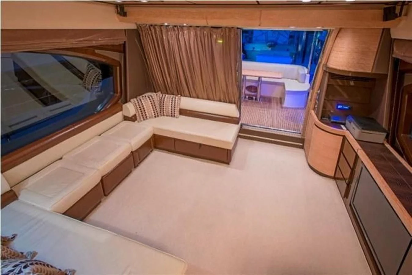 a room with a bed and a window aboard RAMAYA Yacht for Sale