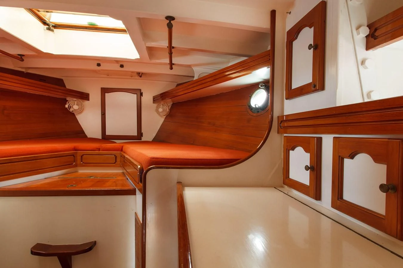 a wooden cabin with a wooden ceiling aboard COPIHUE Yacht for Sale
