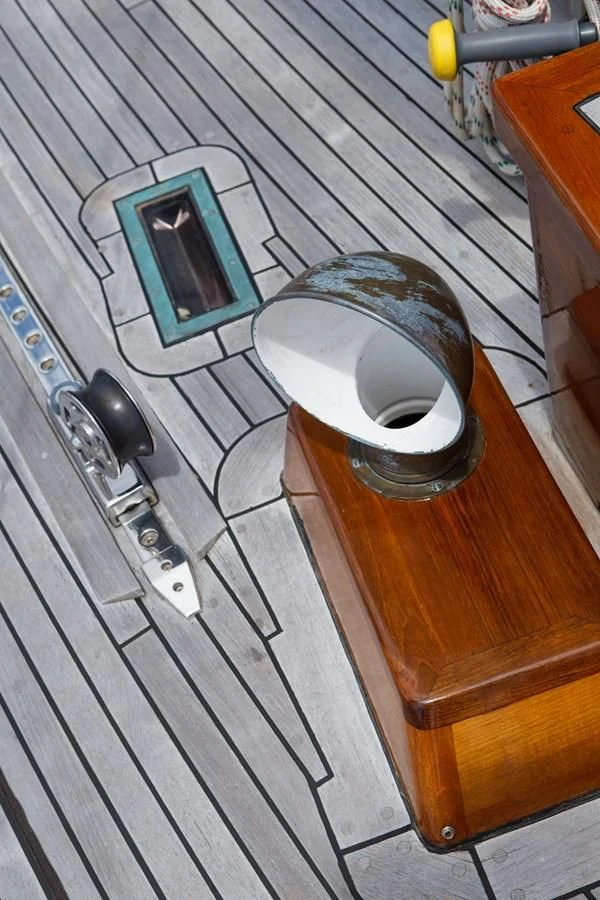 a toilet on a wooden surface aboard COPIHUE Yacht for Sale