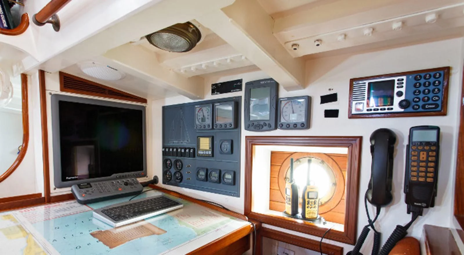 a room with a desk and computer aboard COPIHUE Yacht for Sale