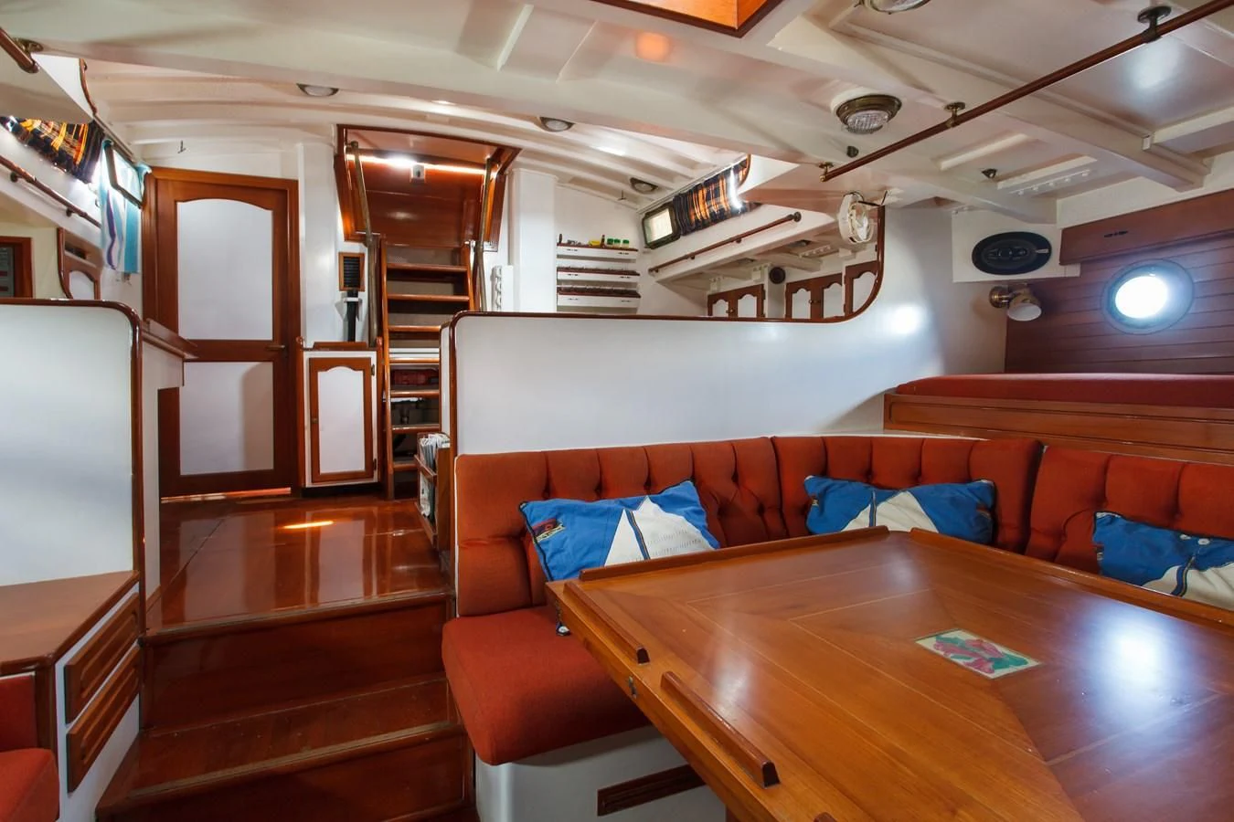 a room with a couch and a table aboard COPIHUE Yacht for Sale