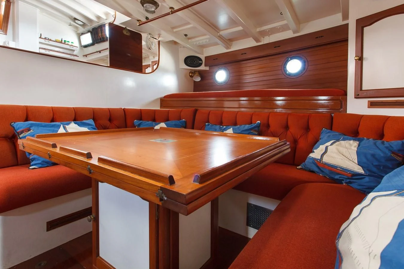 a room with a couch and a table aboard COPIHUE Yacht for Sale