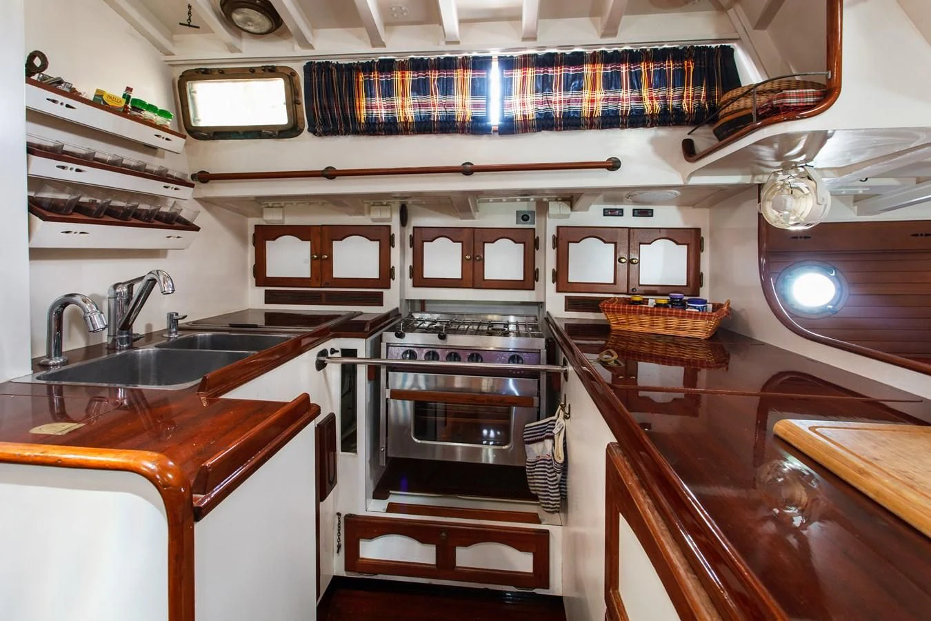 a kitchen with a stove and oven aboard COPIHUE Yacht for Sale