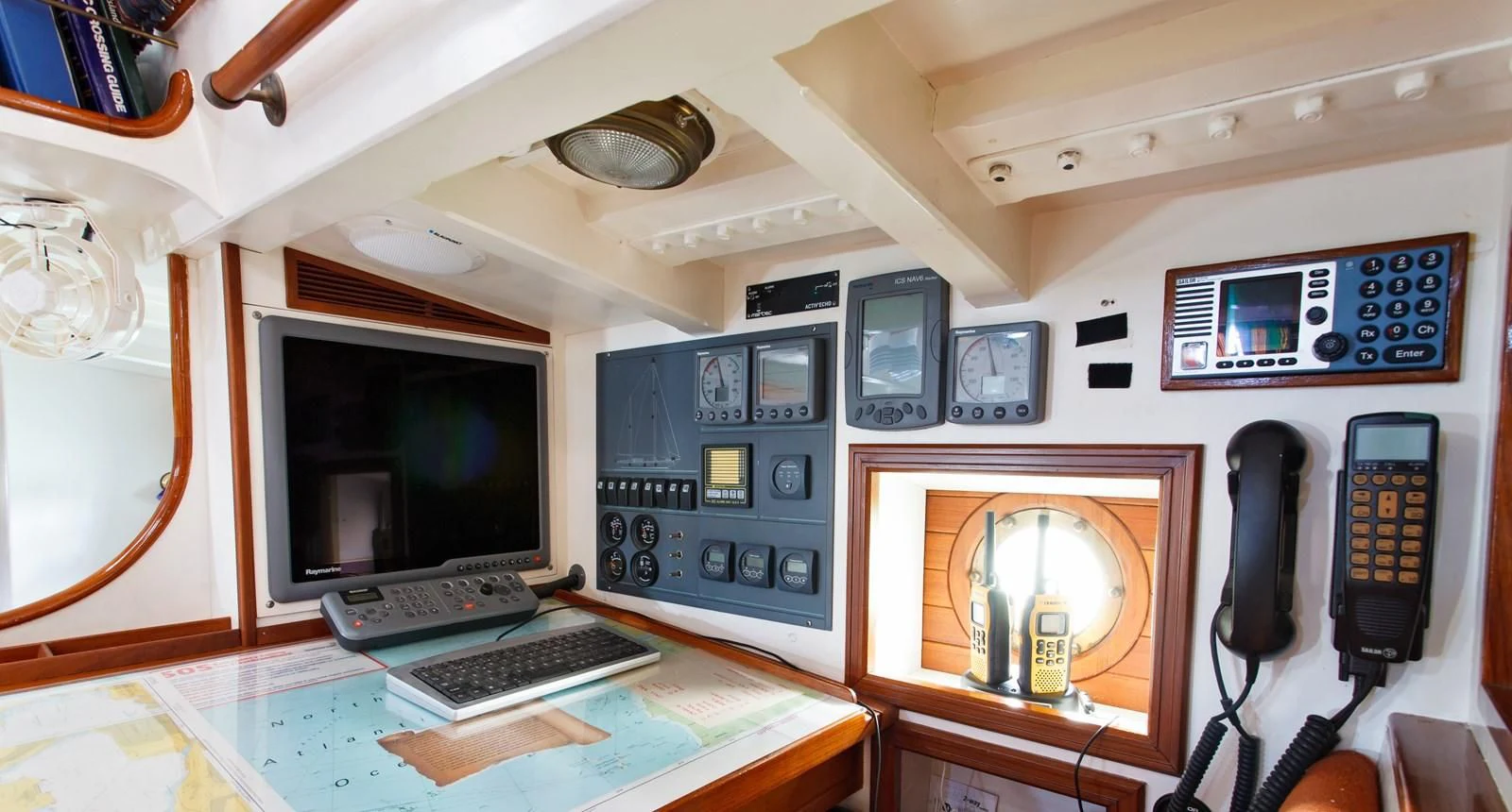 a room with a desk and computer aboard COPIHUE Yacht for Sale