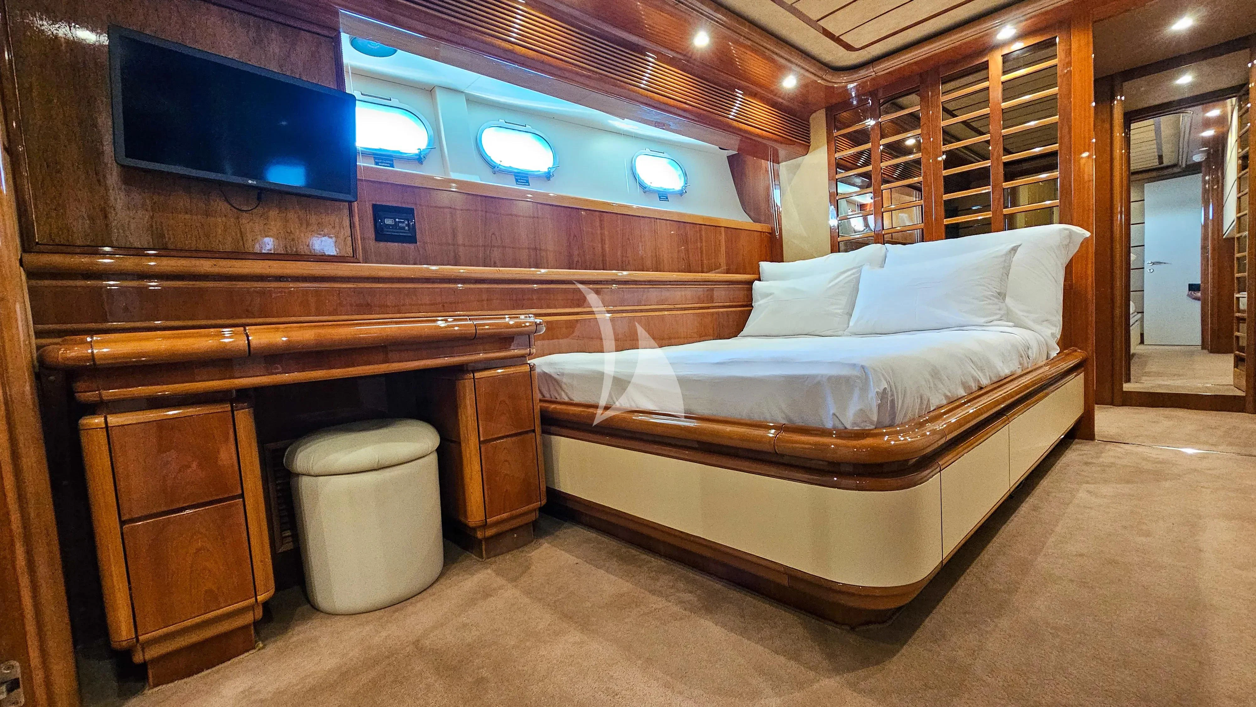 a bed in a room aboard YOLO TOO Yacht for Charter