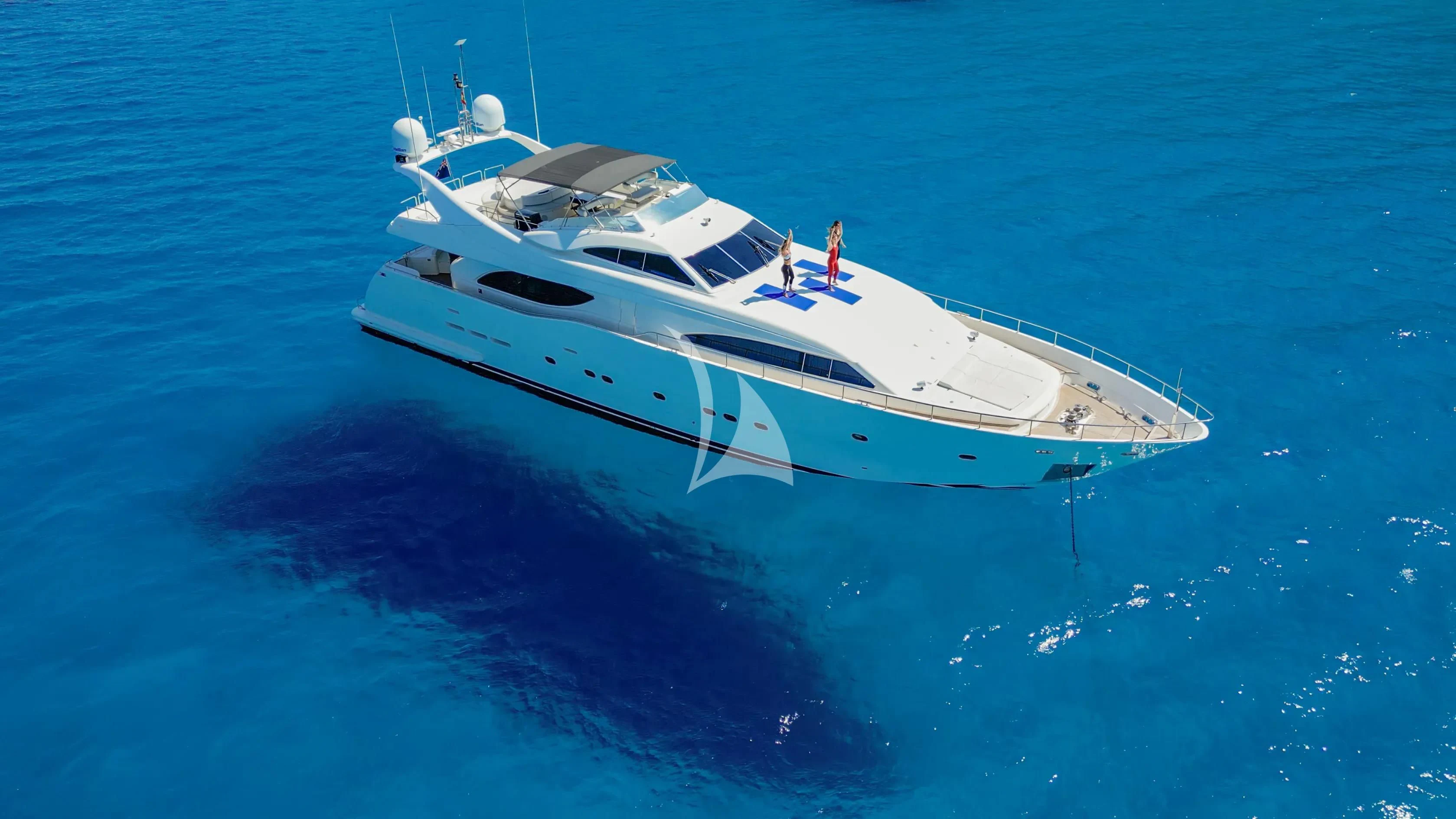 a boat on the water aboard YOLO TOO Yacht for Charter