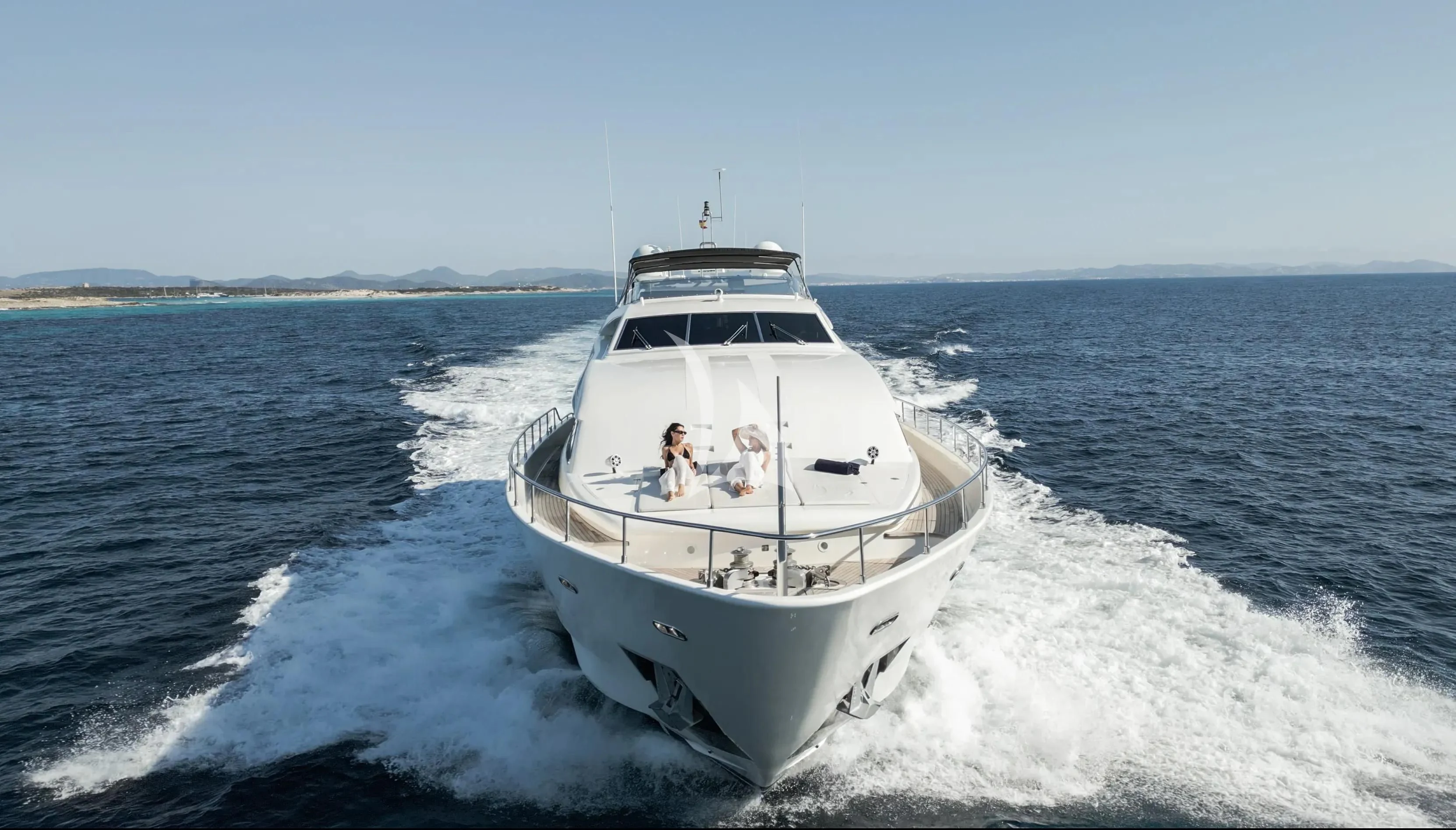 a boat on the water aboard YOLO TOO Yacht for Charter