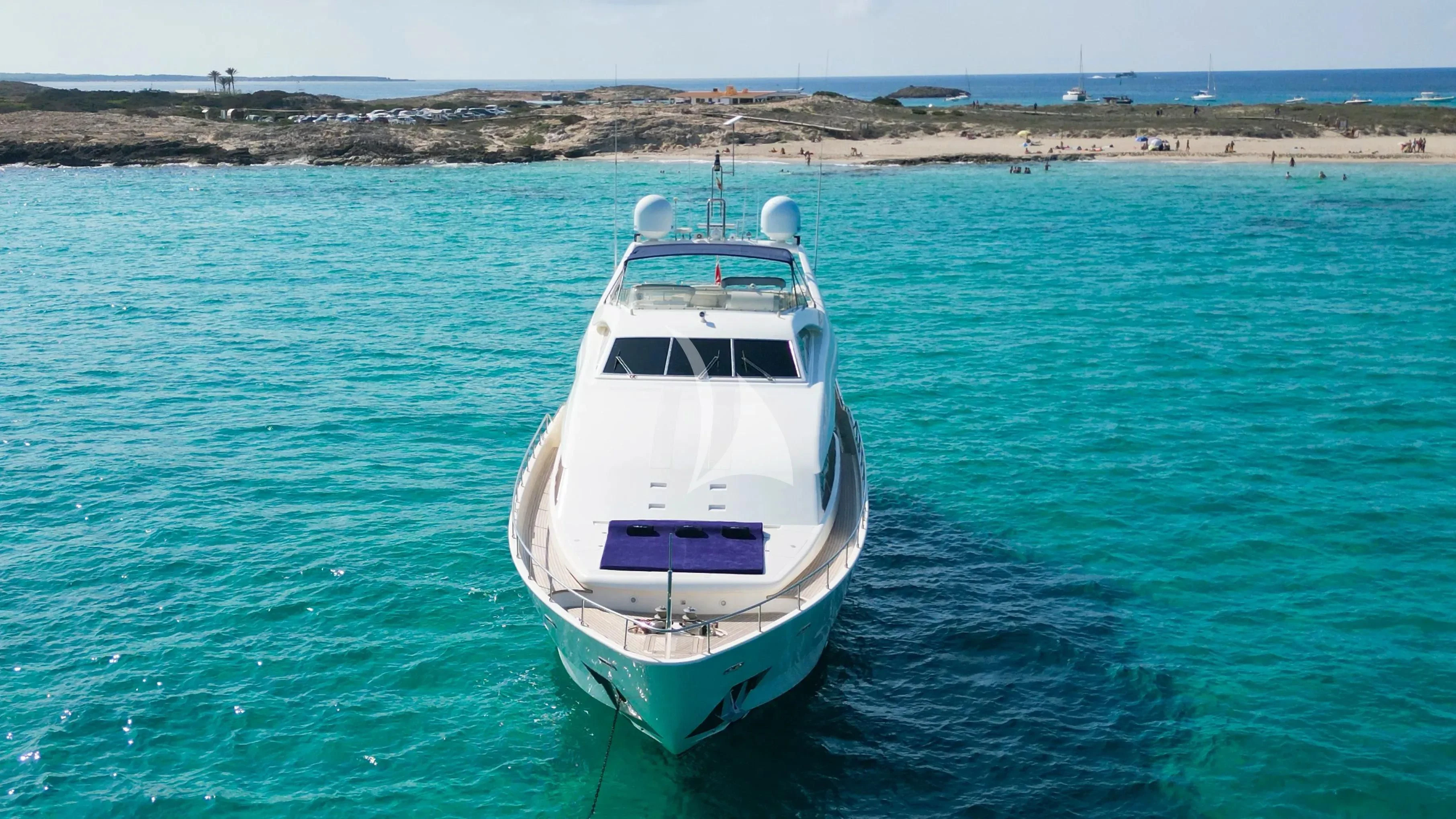 a white boat in the water aboard YOLO TOO Yacht for Charter