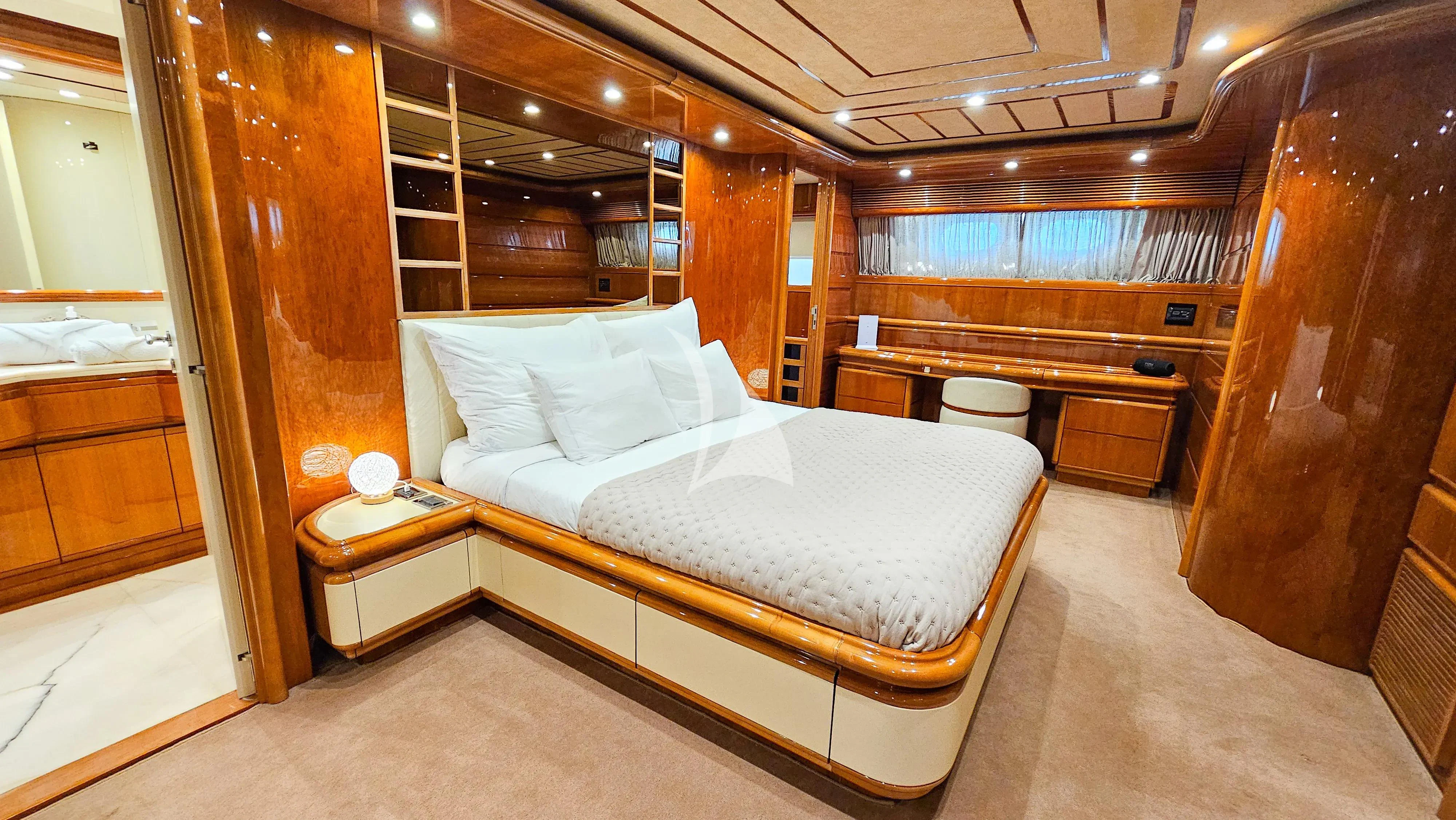 a bed in a room aboard YOLO TOO Yacht for Charter