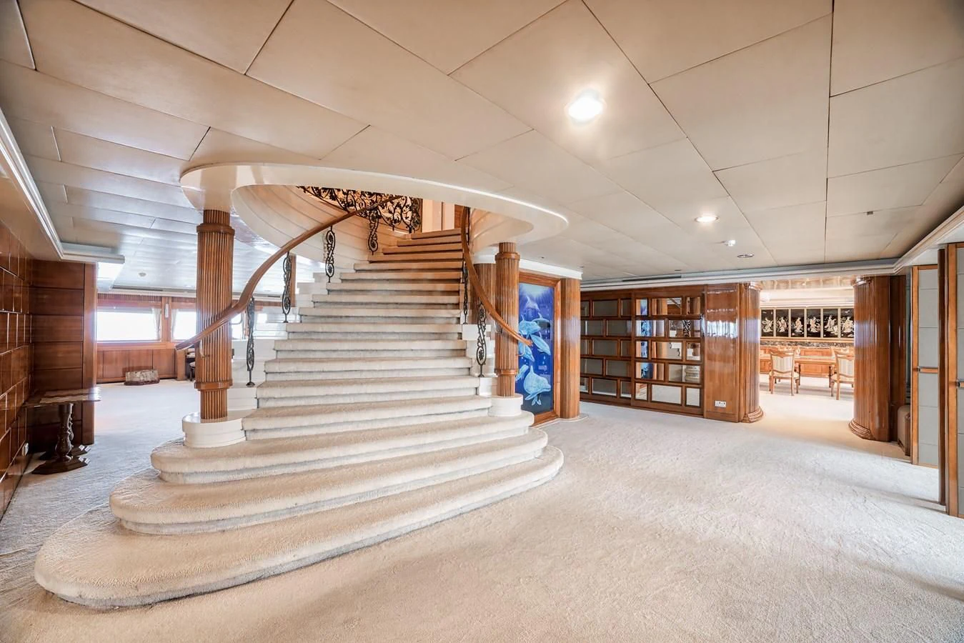 a long white staircase in a building aboard ASEAN LADY Yacht for Sale