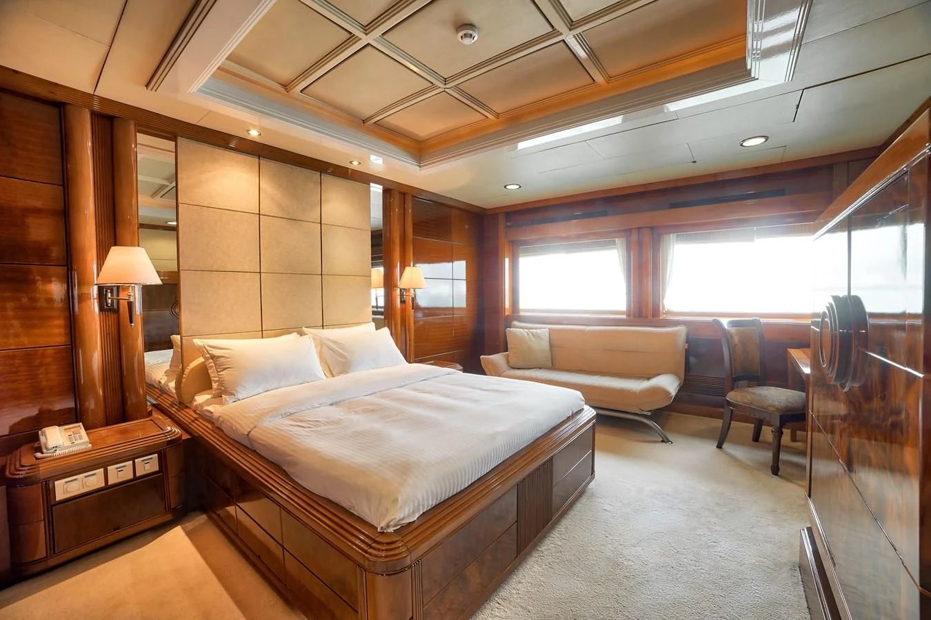 a room with a bed and a couch aboard ASEAN LADY Yacht for Sale