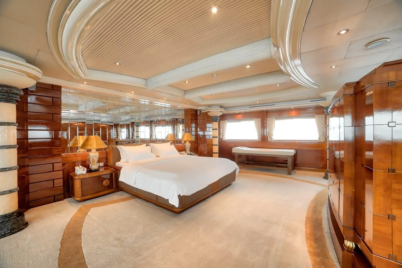 a large bedroom with a large bed aboard ASEAN LADY Yacht for Sale