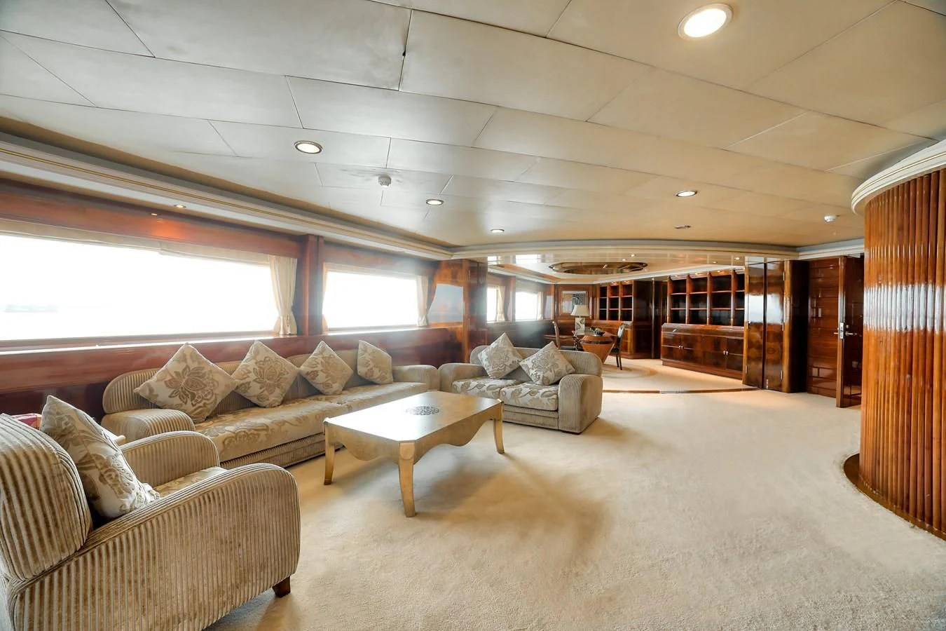 a living room with a couch and a coffee table aboard ASEAN LADY Yacht for Sale