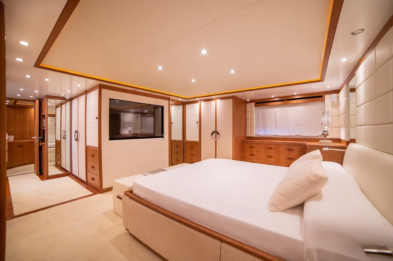 a large bedroom with a bed aboard B TWO Yacht for Sale