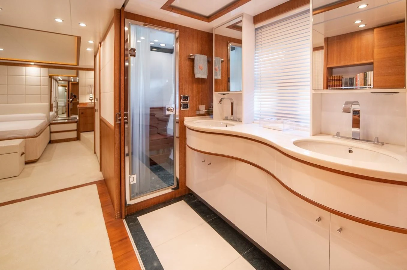 a bathroom with a large mirror aboard B TWO Yacht for Sale