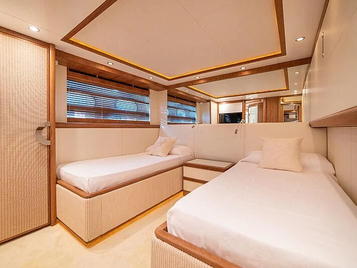 a room with a bed and a window aboard B TWO Yacht for Sale